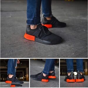 Adidas NMD R1 in black and solar red